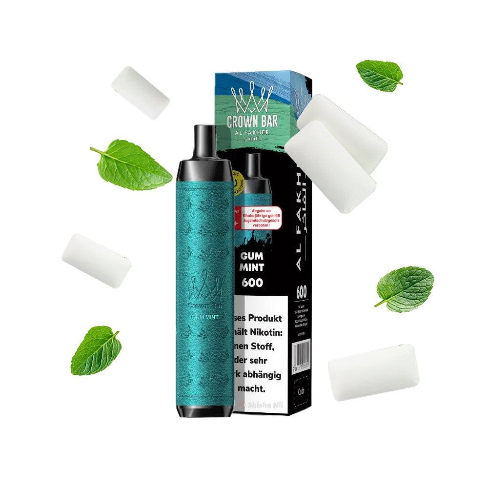 Al Fakher Crown Bar 600 vape with mint leaves and packaging.
