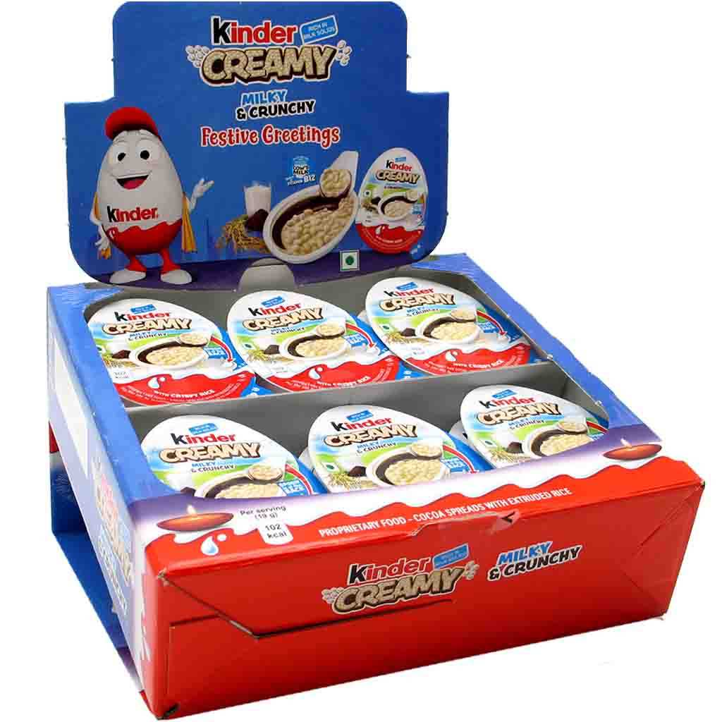 Kinder Creamy 19g display box with milky and chocolate treats.